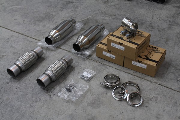 exhaust clamps and parts laying on the floor