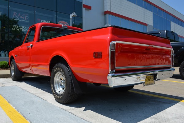 red 1971 chevy c-10 pickup truck, rear driver side