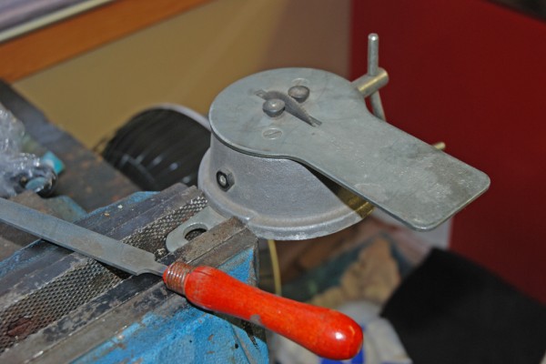piston ring filing tool in a bench vise