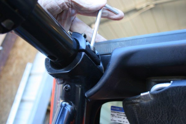 installing a support bar into a roll cage