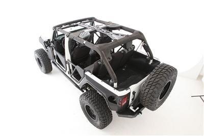 smittybilt roll cage in a jeep wrangler