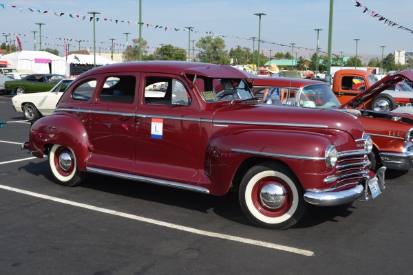 vintage prewar plymouth sedan at a cruise in car show