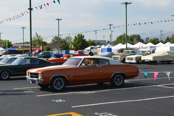copper and white chevelle ss fastback coupe at car show