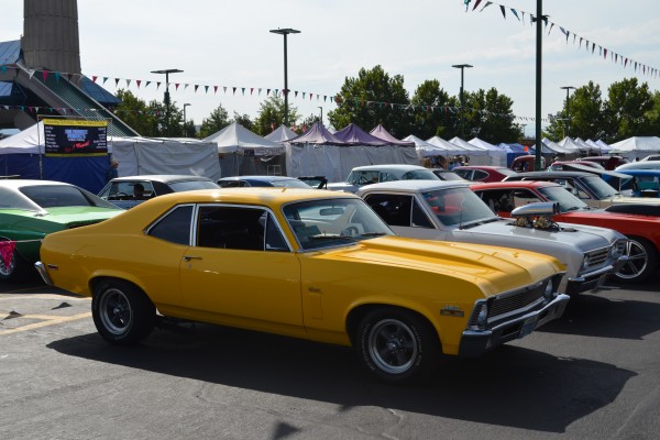 yellow chevy nova coupe with 350 v8 engine