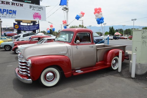 vintage Chevrolet pickup truck at a car show