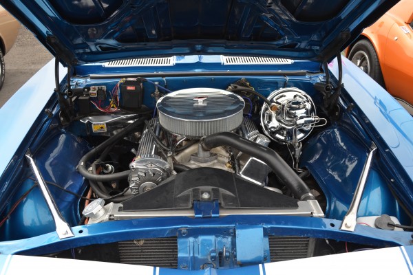 a v8 engine in a vintage muscle car
