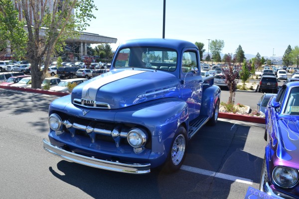vintage ford truck at a cruise in car show
