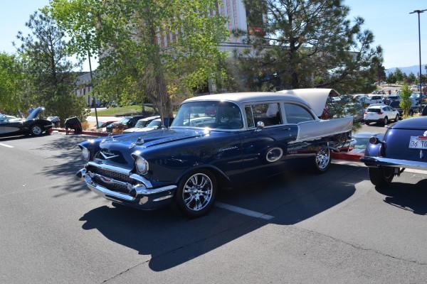 customized tri-five chevy hot rod at car show