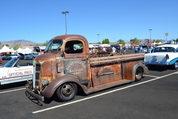 vintage patina rat rod flatbed truck at car show