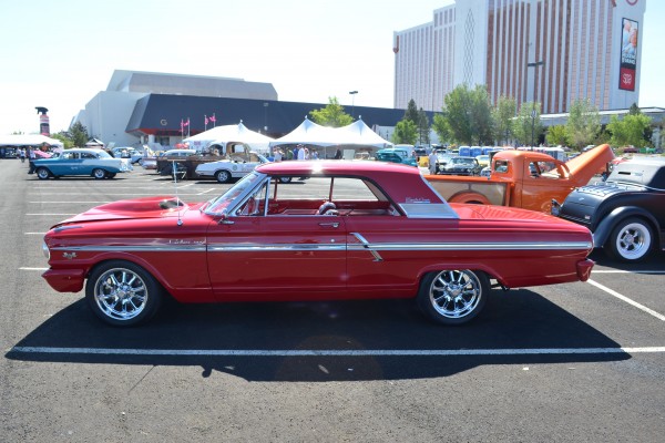 ford fairlane 500 red coupe at car show