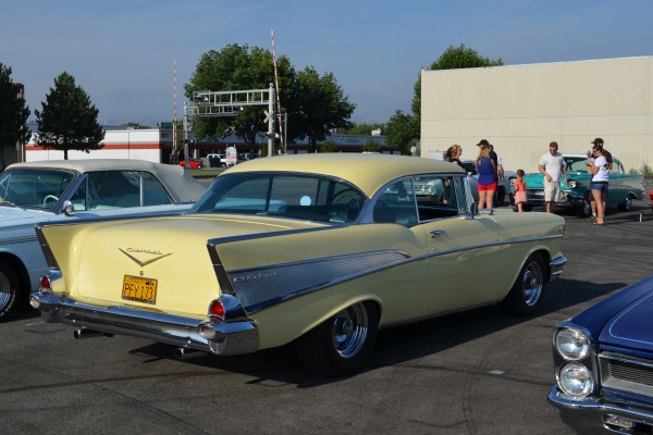 yellow 1957 chevy bel air hardtop coupe