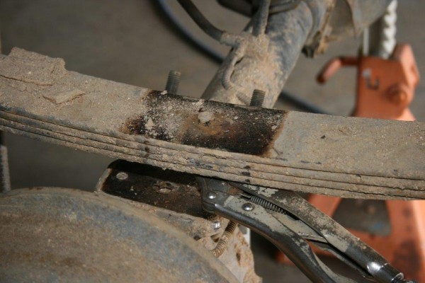 removing axle and leaf spring clamp