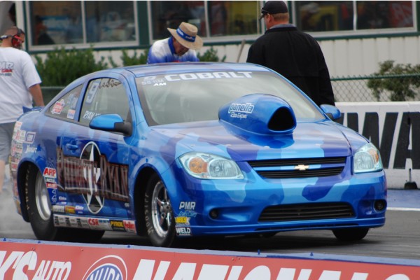 chevy cobalt drag car launching on a race track