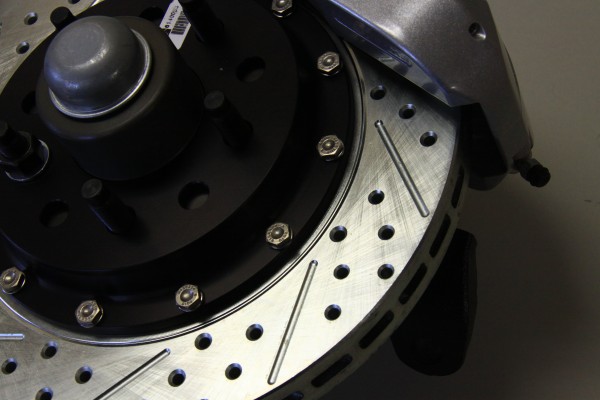 close up of a drilled and slotted brake rotor