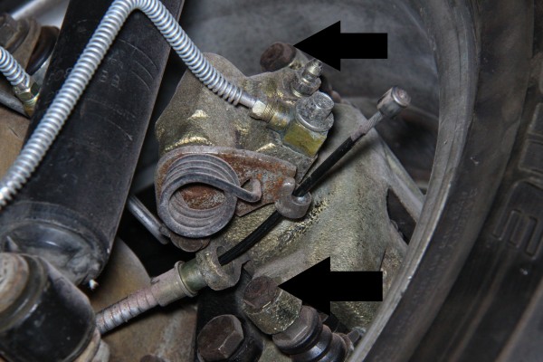 bolts on a ford mustang disc brake caliper