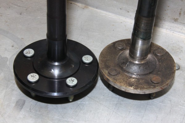 side by side comparison of new and stock ford mustang axle shafts