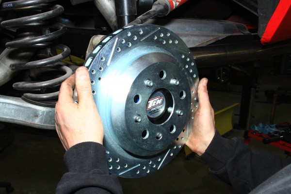 slipping a brake rotor onto a hub