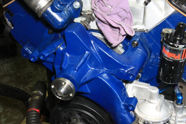 water pump on the front of a ford fe series engine 390