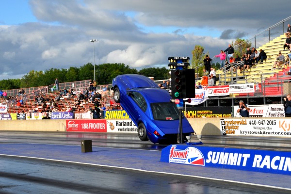 ford mustang sn95 new edge doing a massive wheelstand at drag strip