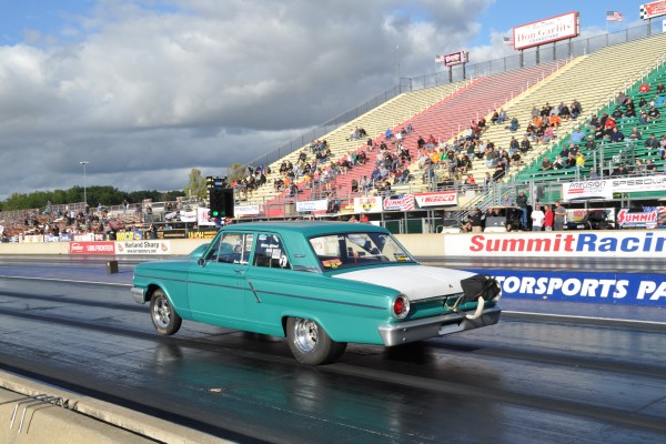 vintage ford falcon launching at drag strip racetrack