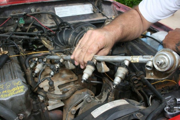removing the fuel rail from a jeep 4.0L engine