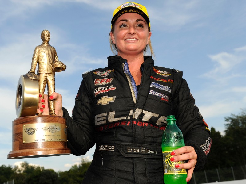 erica enders holding a wally trophy