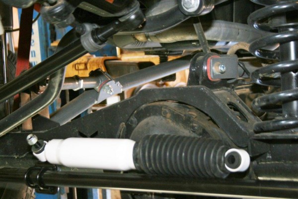 close up of steering stabilizer on a modified jeep wrangler tj