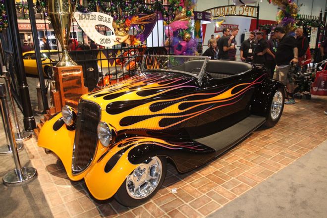 flamed hotrod coupe in sema booth