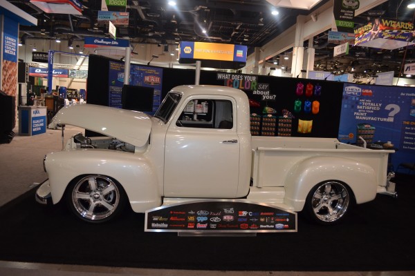 white chevy 3100 truck on display at SEMA 2015, side