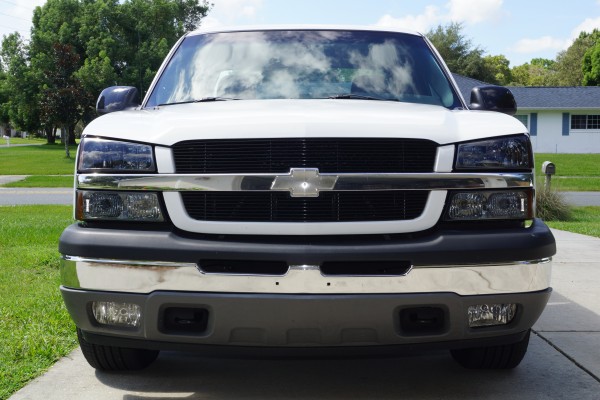 chevy silverado with aftermarket grille and light upgrades