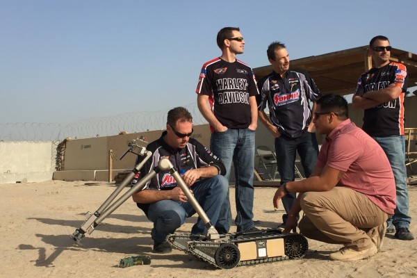 nhra drivers learning about bomb disposal robot