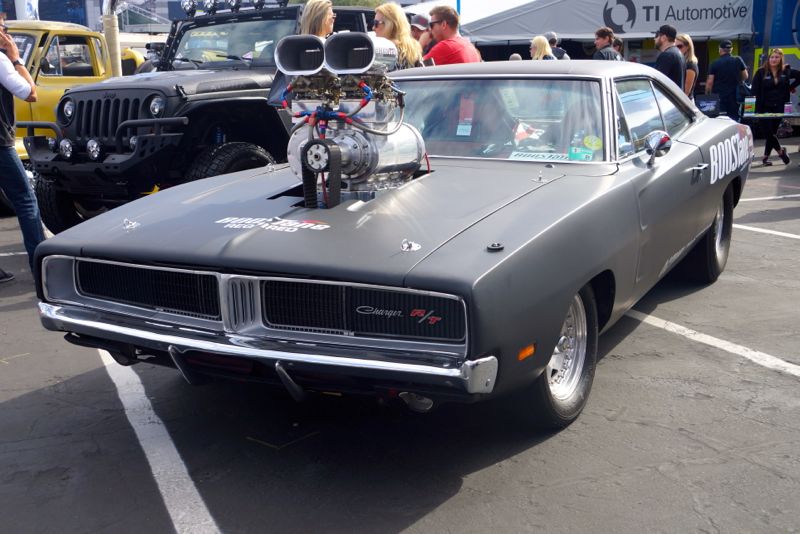 dodge charger with supercharged blower sticking through the hood