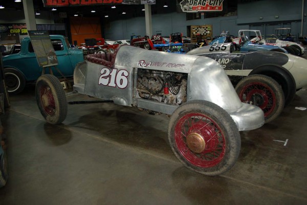 vintage speedster style racer with flathead ford v8 engine