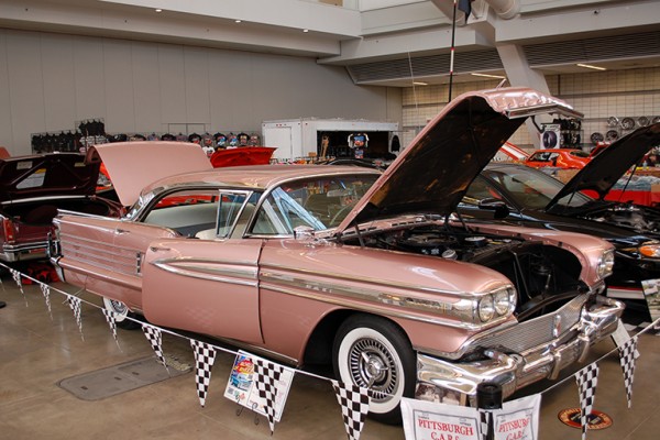 classic car at a car show indoors