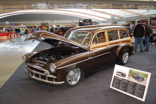 vintage postwar chevy woody wagon on display at car show