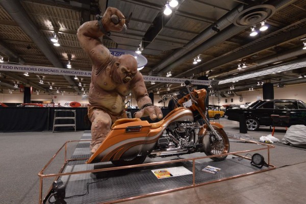 bagger style custom motorcycle at indoor car show