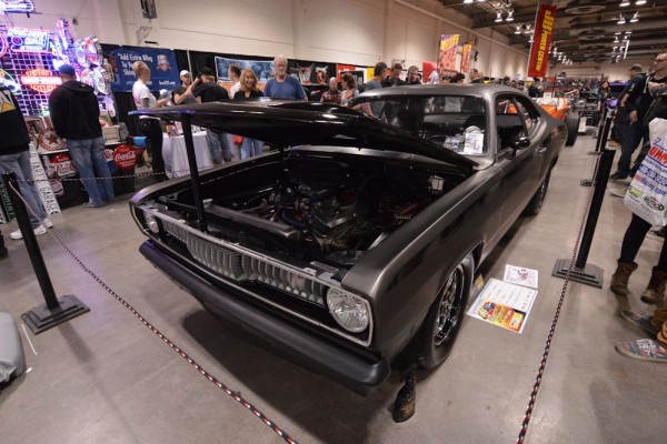 plymouth duster muscle car at indoor car show