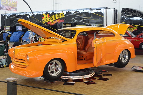 orange custom hotrod at indoor car show