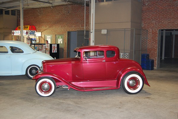 fendered five window ford hot rod at indoor car show
