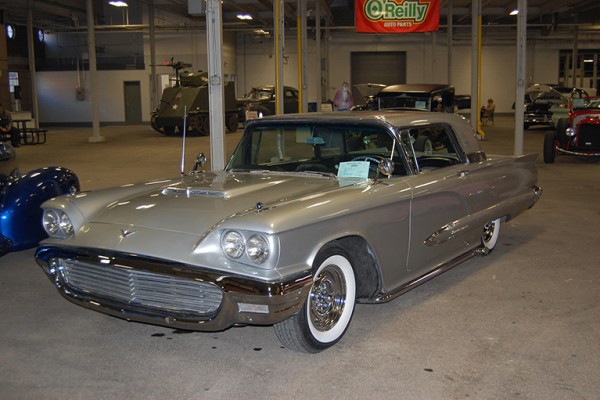 silver 1960s era ford thunderbird