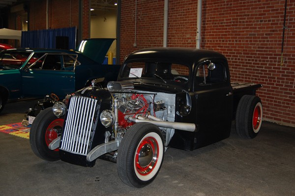 vintage hot rod truck at indoor car show