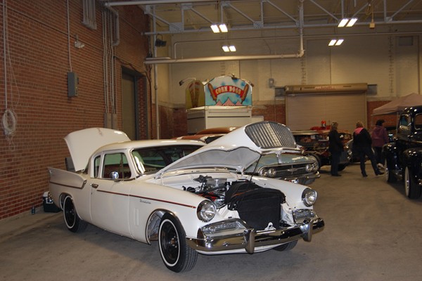 white studebaker hawk coupe at indoor car show