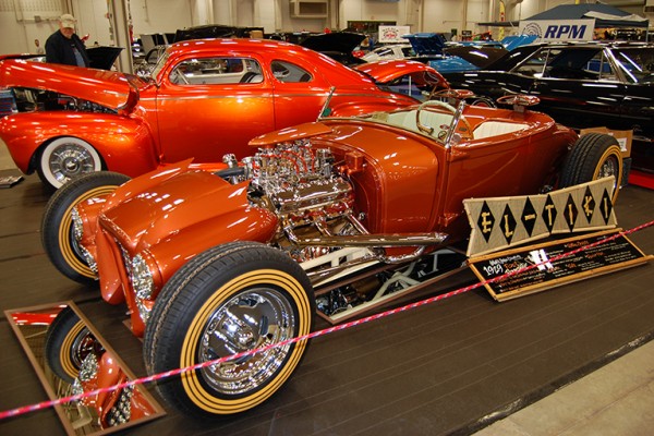 custom hot rod coupe at indoor car show