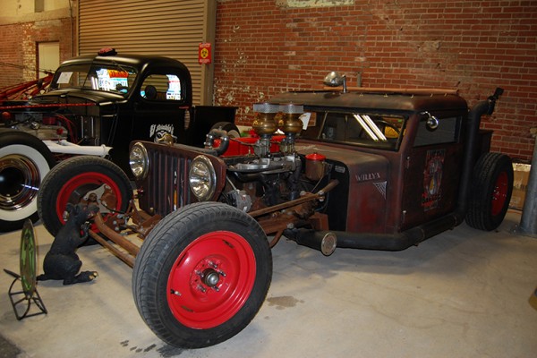 vintage willys jeep rat rod at indoor car show