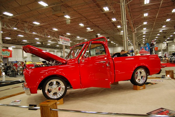 red chevy c10 truck at indoor car show