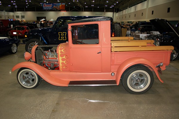 vintage hot rod pickup truck at indoor car show