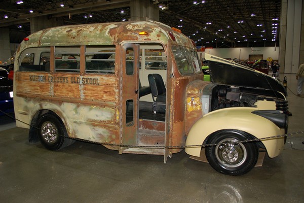 vintage rusty school bus at indoor car show