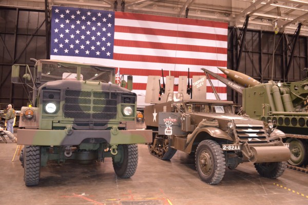 military vehicle display at indoor car show