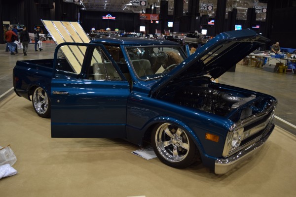 lowered custom chevy c10 truck at indoor car show