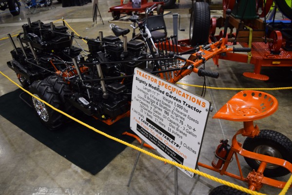 modified hot rod tractor on display at indoor car show